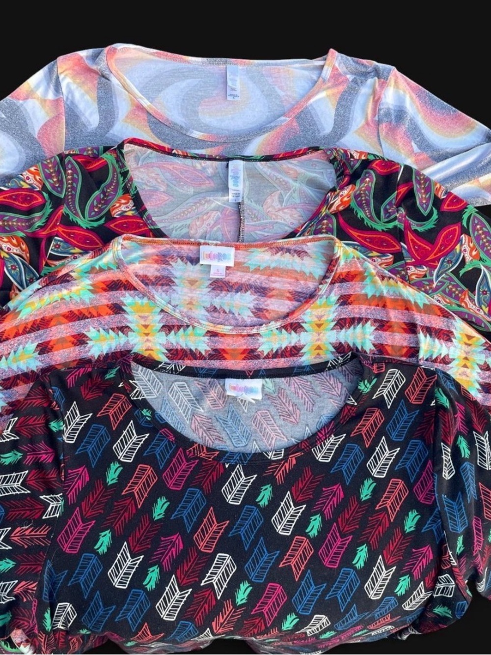 LuLaRoe 4 pack womens Short Sleeve Tees - Multicolor Feathers & Geometric Prints
